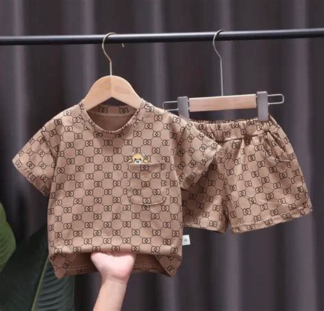 baby boy gucci romper|farfetch Gucci baby clothes.